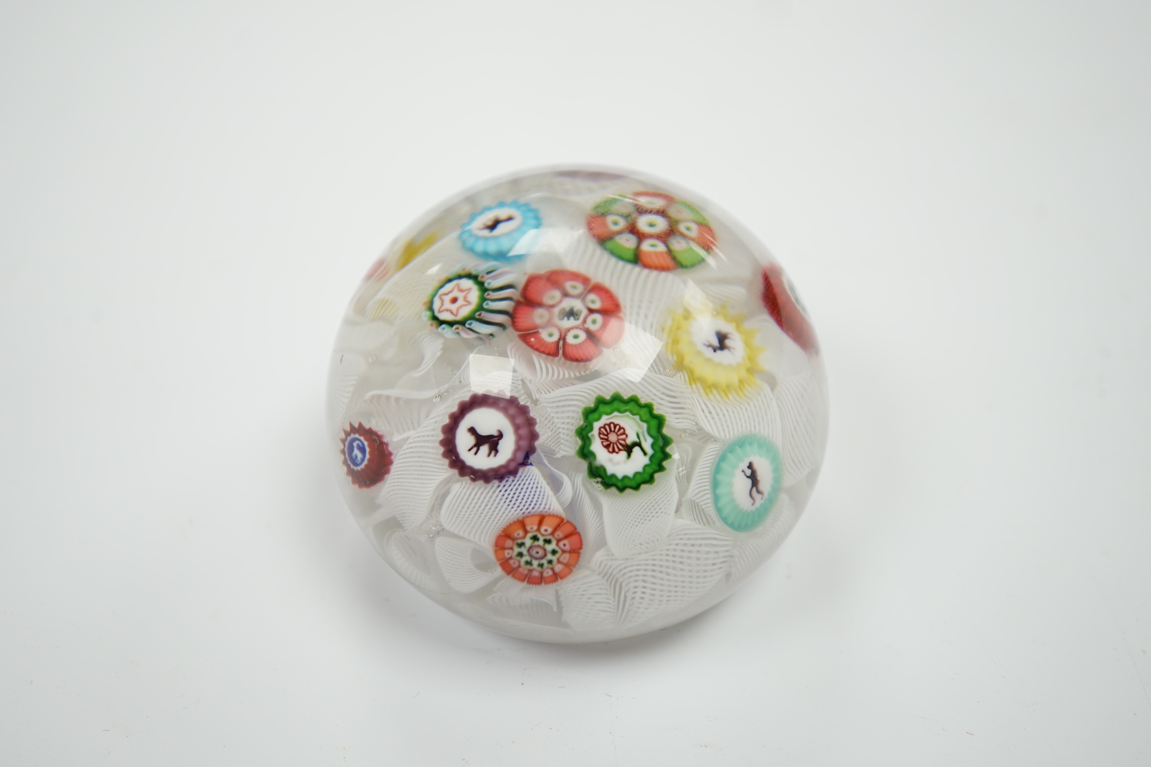 A Baccarat glass upset muslin paperweight, 6cm in diameter